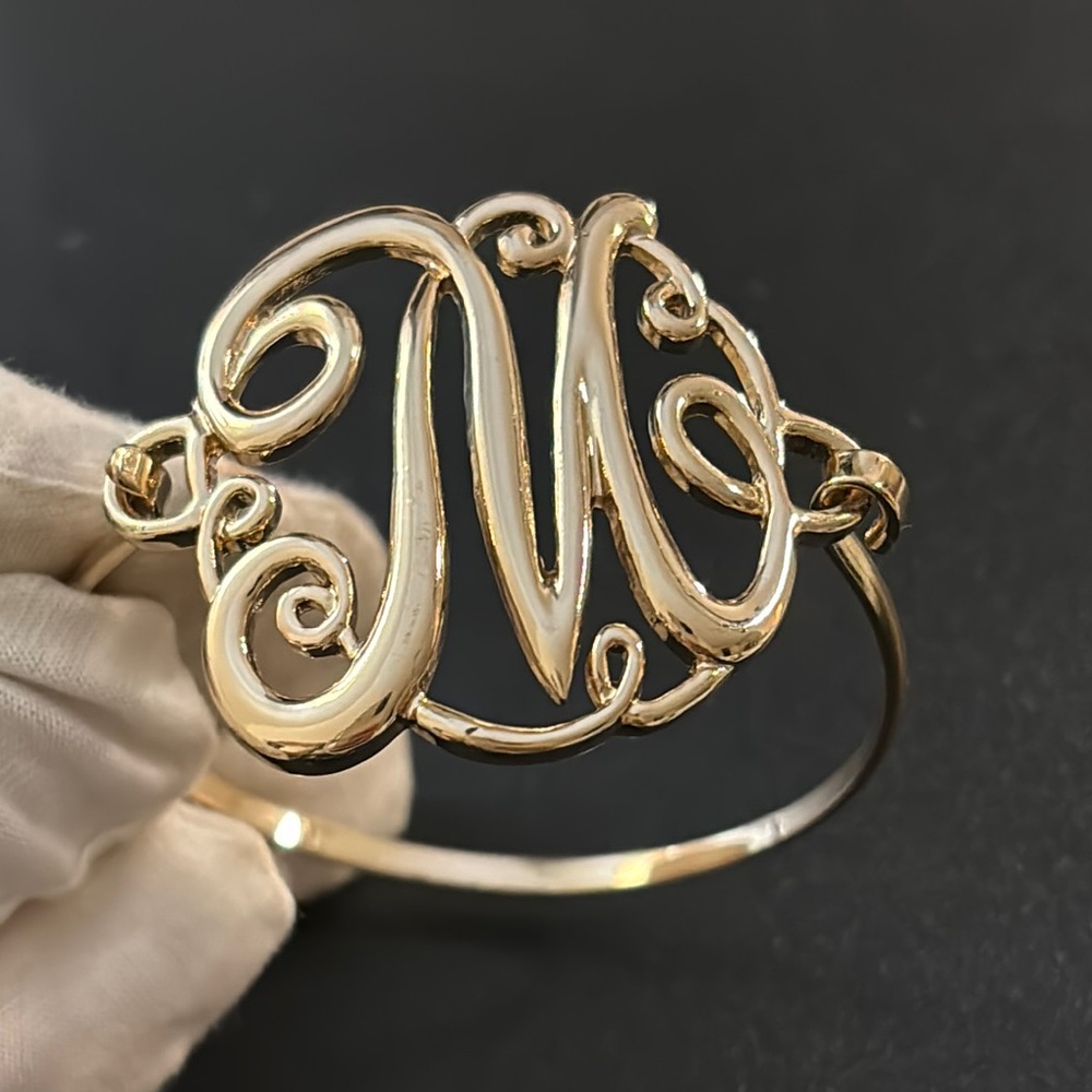 Vintage gold tone monogram M bracelet